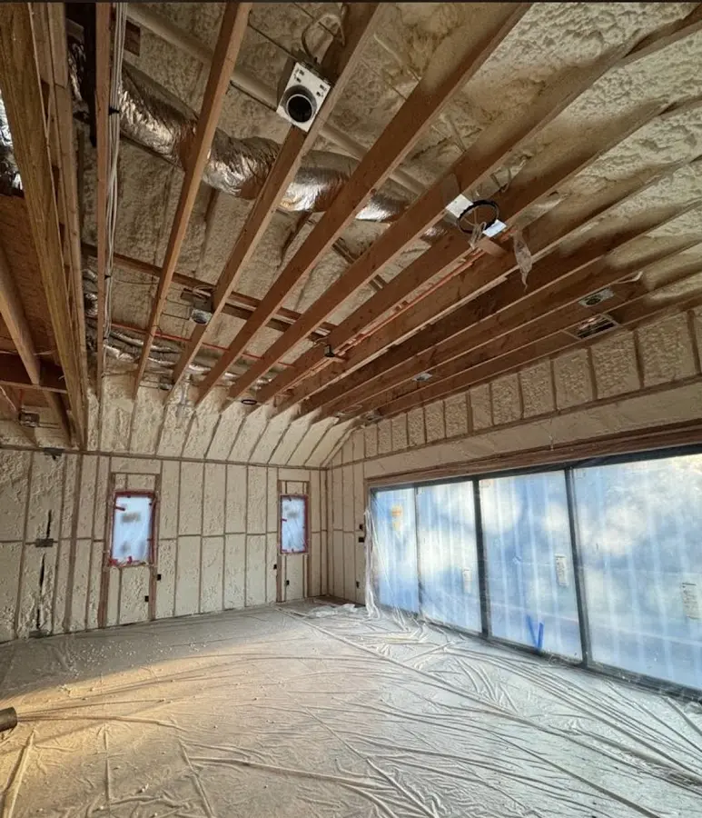 Interior walls and ceiling insulated with spray foam during new construction in Fort Morgan